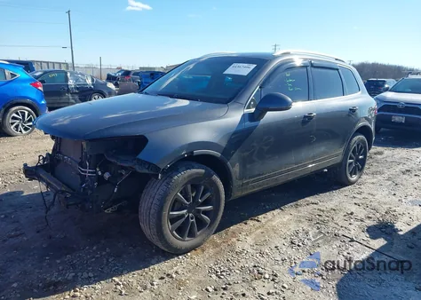 2014 Volkswagen Touareg 3.6L Sport z USA, uszkodzony, nr VIN WVGEF9BP2ED008972